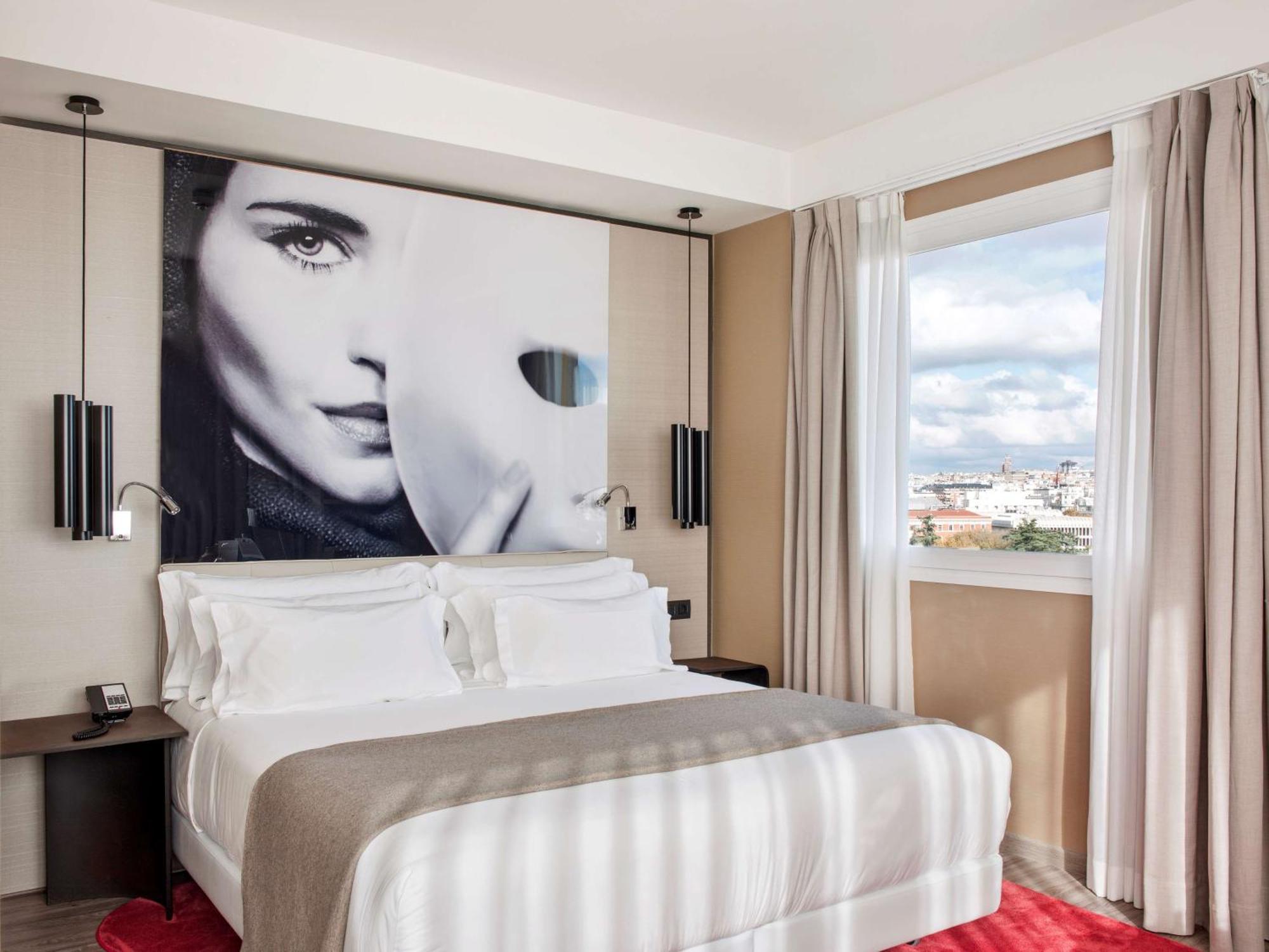 فندق إن إتش كوليكشن مدريد سيوسيا المظهر الخارجي الصورة A room at the hotel