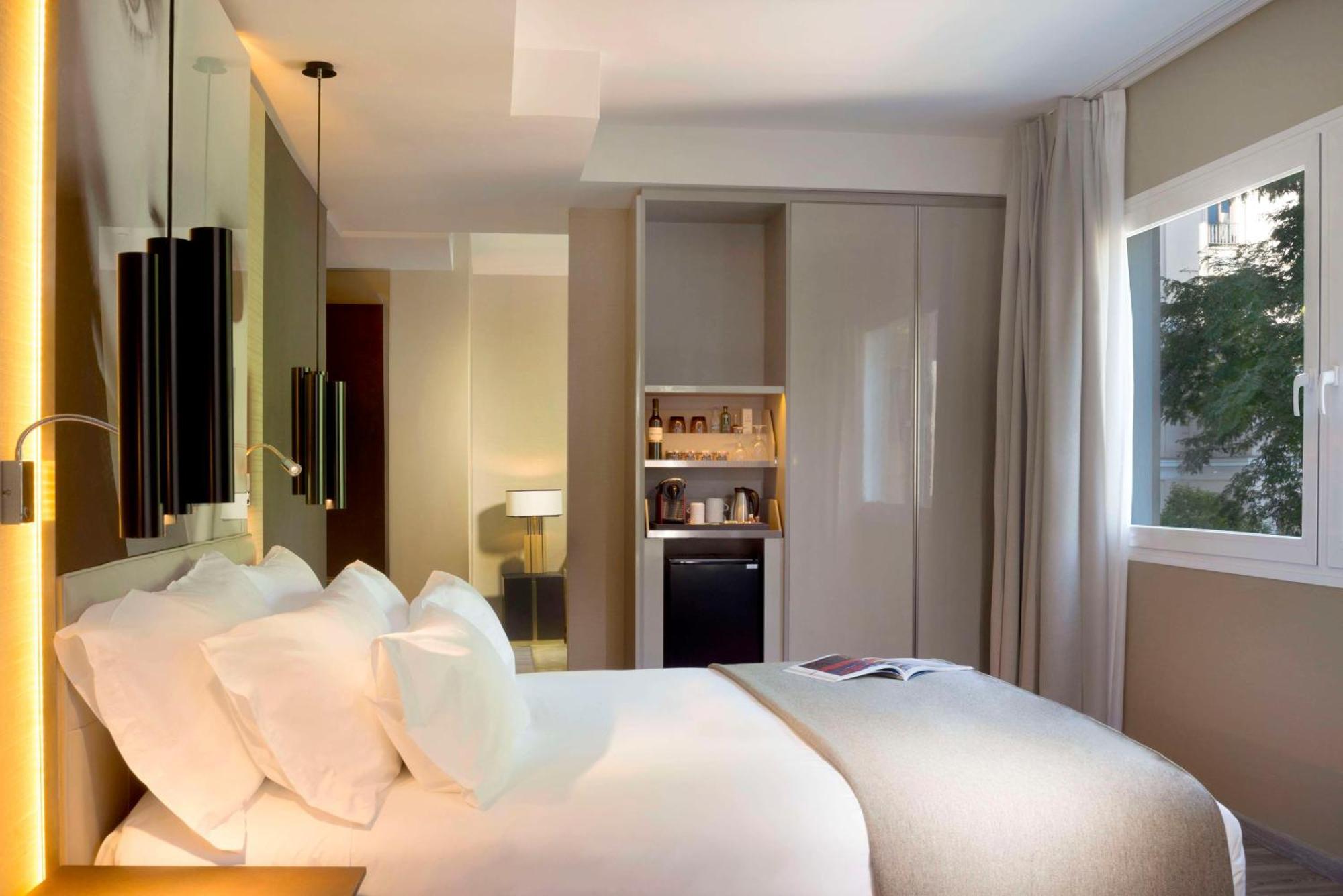 فندق إن إتش كوليكشن مدريد سيوسيا المظهر الخارجي الصورة A typical room at the hotel