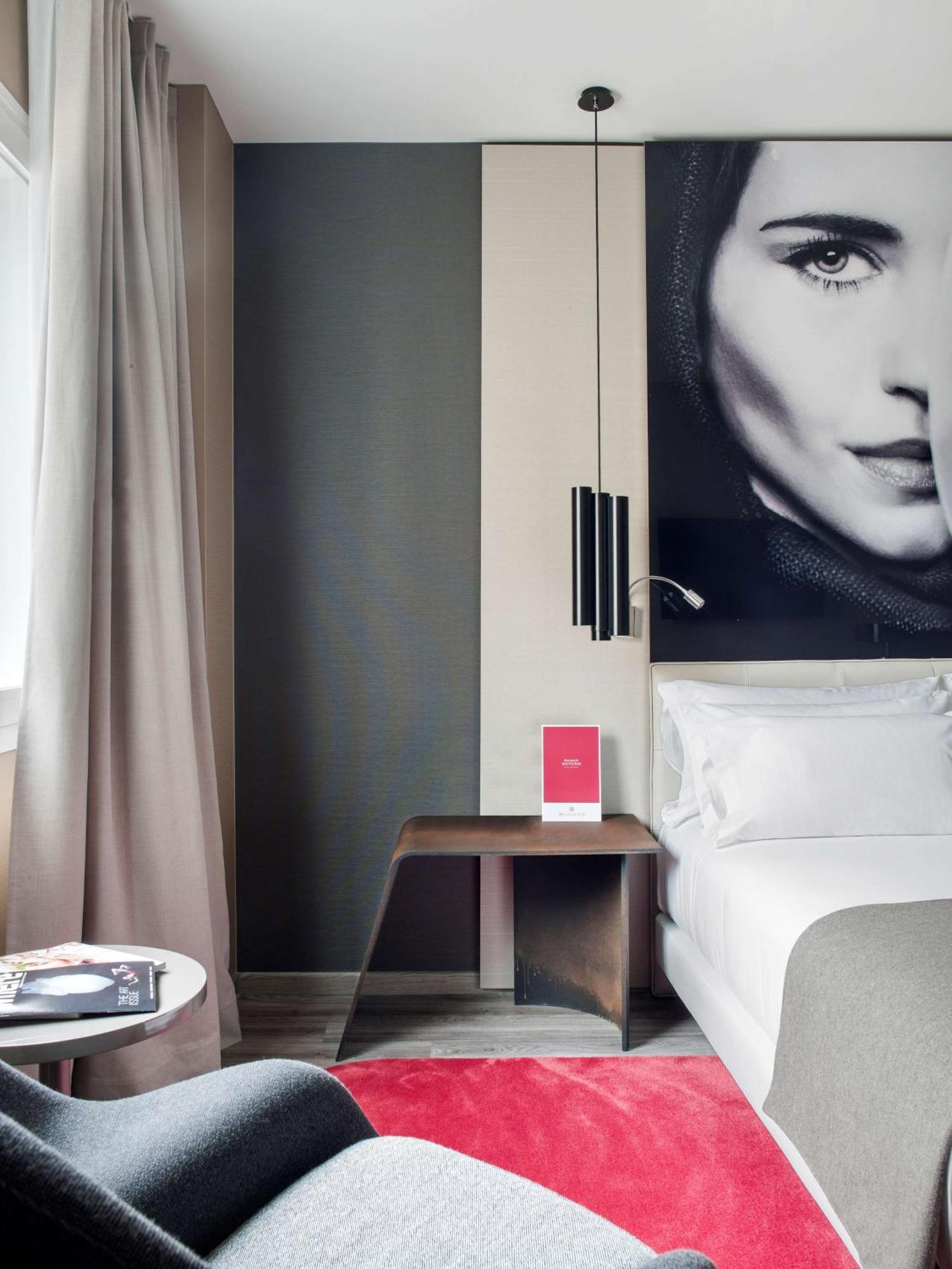 فندق إن إتش كوليكشن مدريد سيوسيا المظهر الخارجي الصورة A room at the hotel