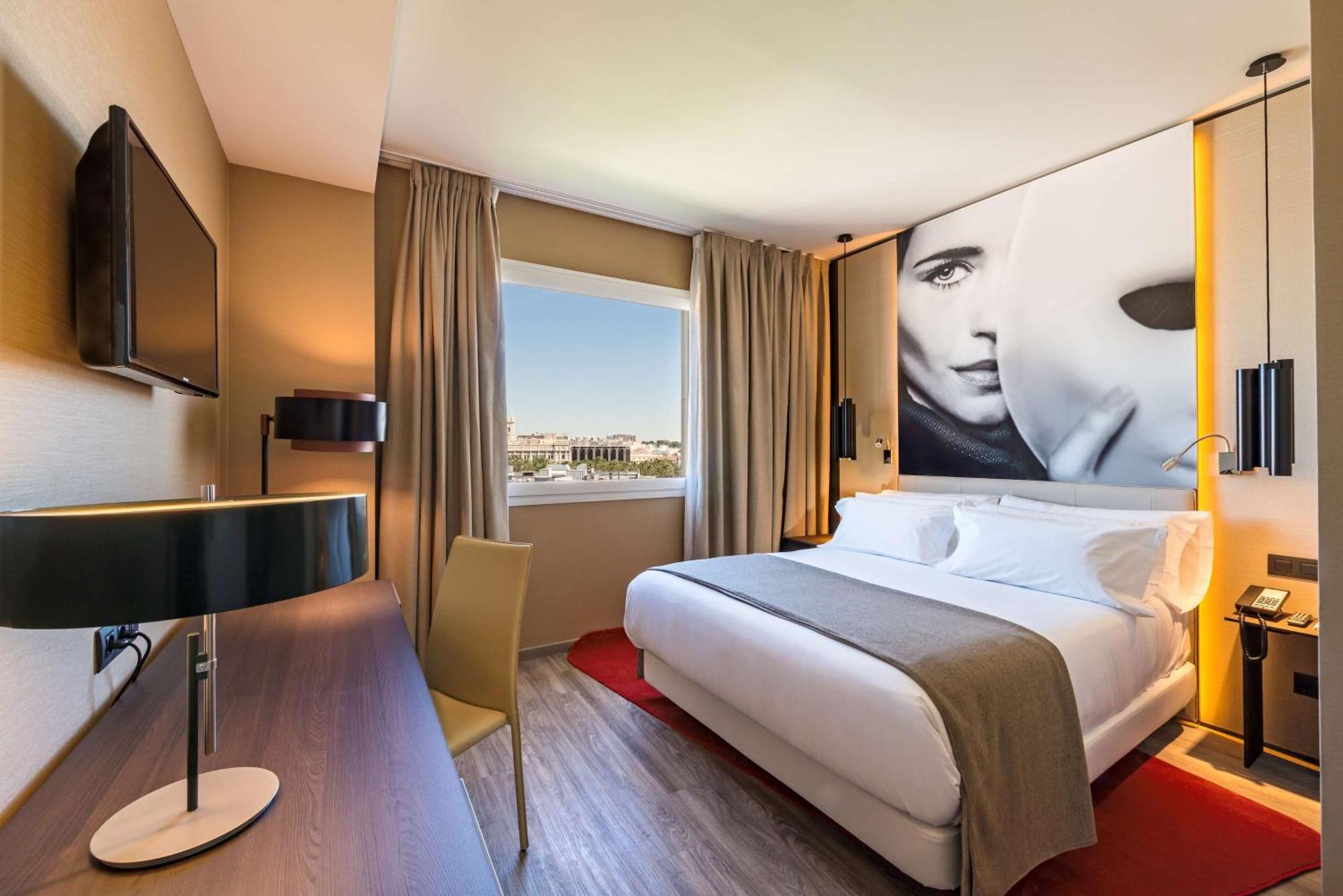 فندق إن إتش كوليكشن مدريد سيوسيا المظهر الخارجي الصورة A room at the hotel